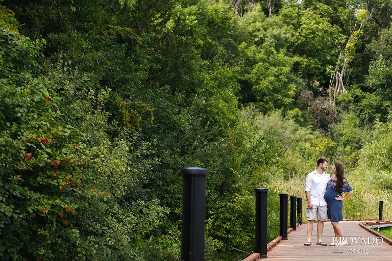 John and Nova posing on a wooden walkway