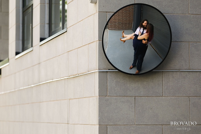 Andy holding Bethany in a mirror