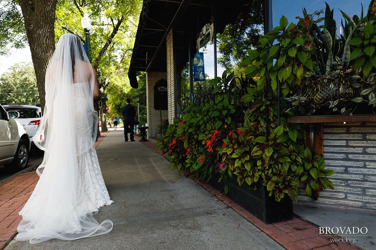 Bride walking towards groom for first look