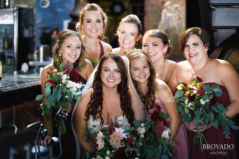 Bride surrounded by her bridesmaids