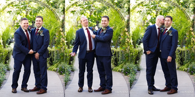 Groom doing goofy poses with groomsmen