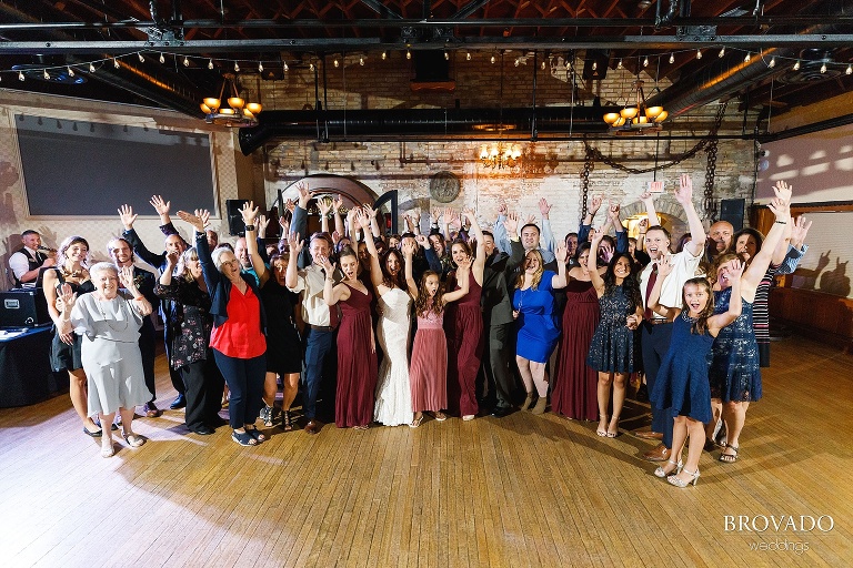 Jacquelyn and Brian's wedding guests cheering