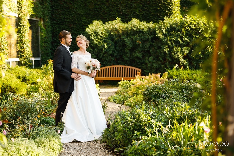 Karen and Matthew pose outside their wedding venue in St. Paul