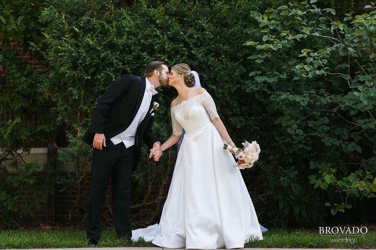 Karen and Matthew lean in for a kiss