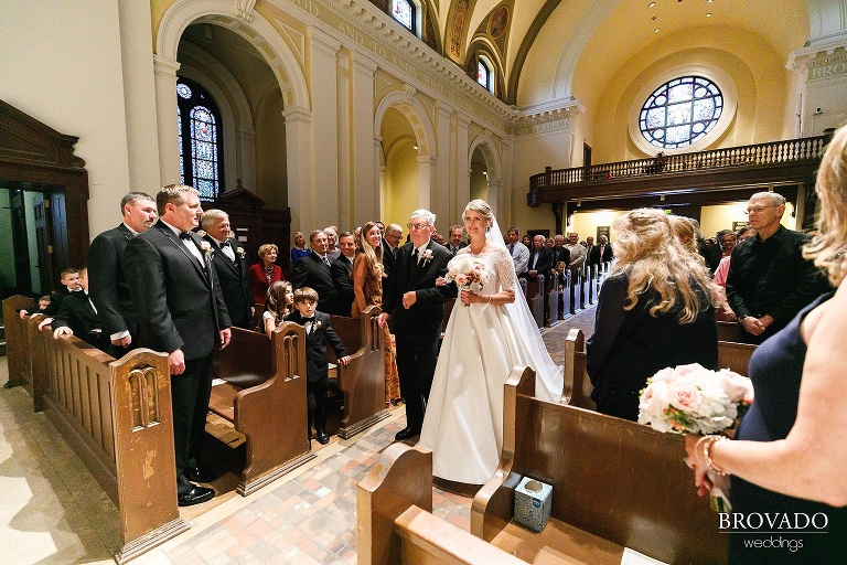 Father of the bride walking Karen down the aisle