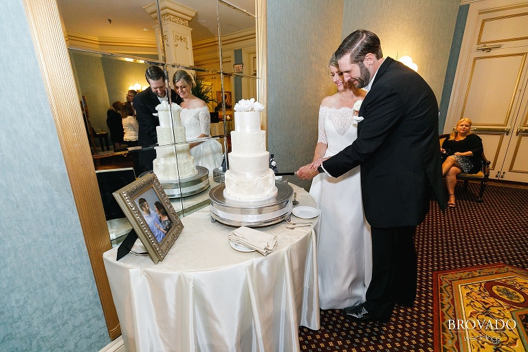 Bride and groom cutting the cake