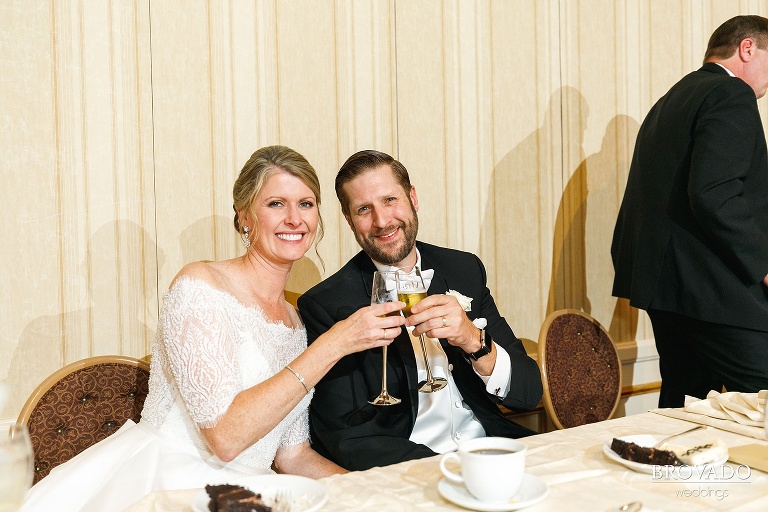 Karen and Matthew smiling during champagne toast