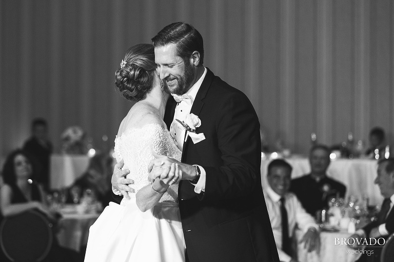 Bride and Groom share first dance in black and white