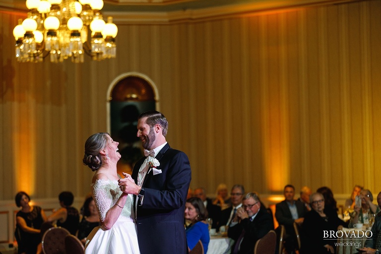 Karen and Matthew laugh while dancing