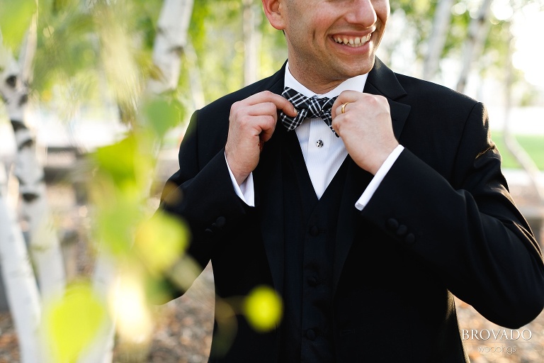 Ethan adjusting his bowtie