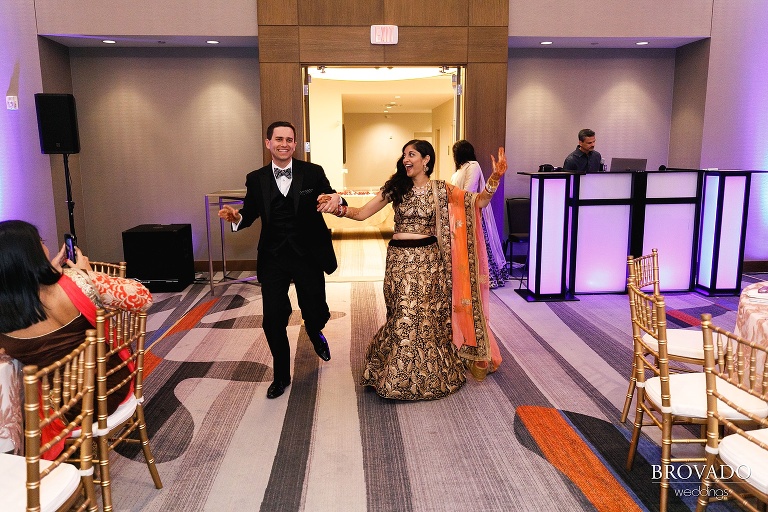 Sruti and Ethan dancing into their wedding reception