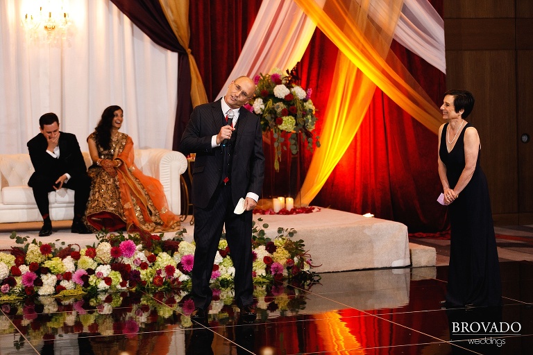 Ethan's parents giving a speech