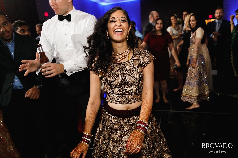 Bride Sruti smiling and dancing