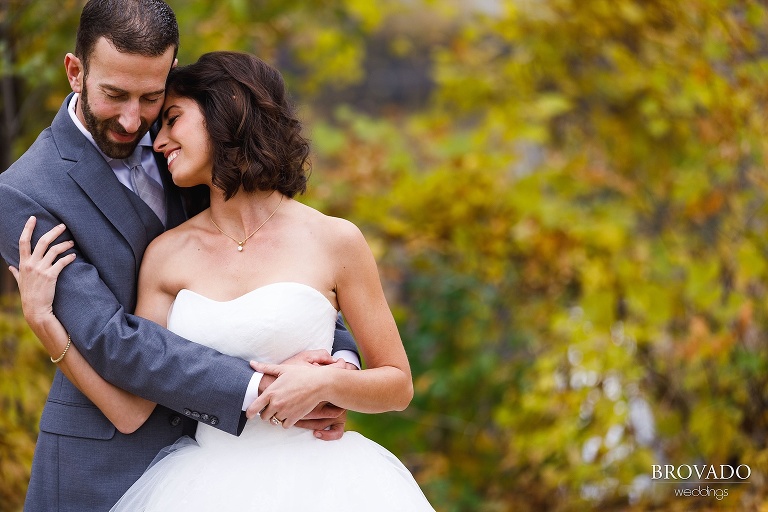 Stephanie leaning on her groom