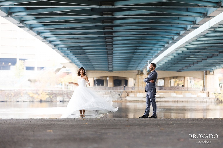 Stephanie spinning underneath an overpass in downtown Minneapolis