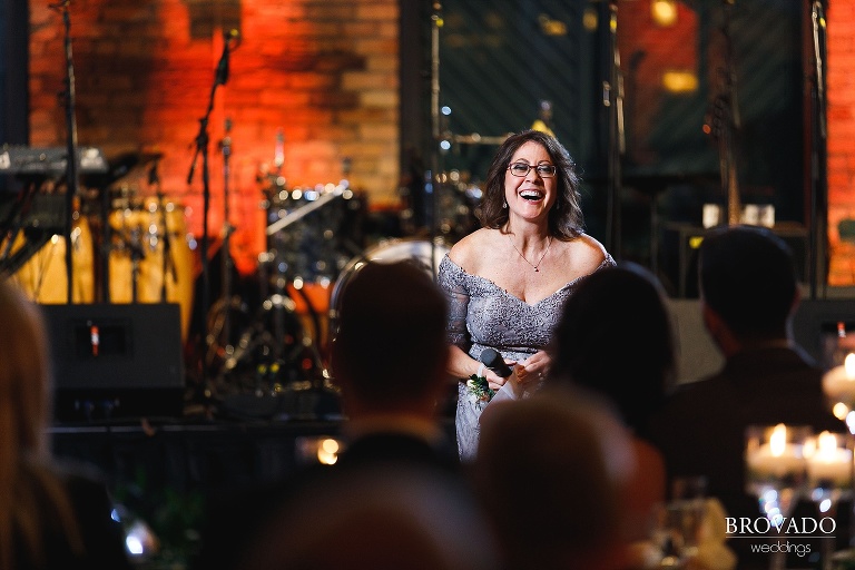 mother of the bride laughing during speech