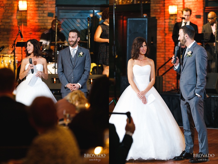 bride and groom giving a speech at wedding reception