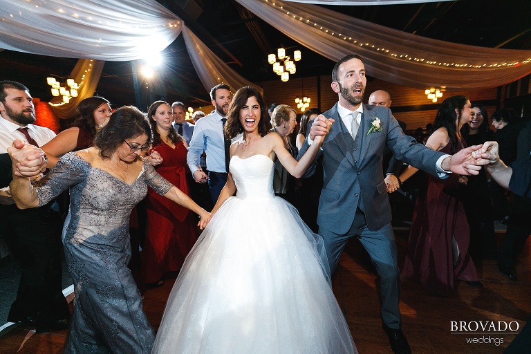 Bride and groom during hora