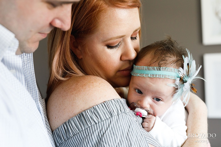 April and Mike holding newborn Nellie