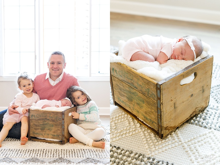 family posing next to newborn baby willa