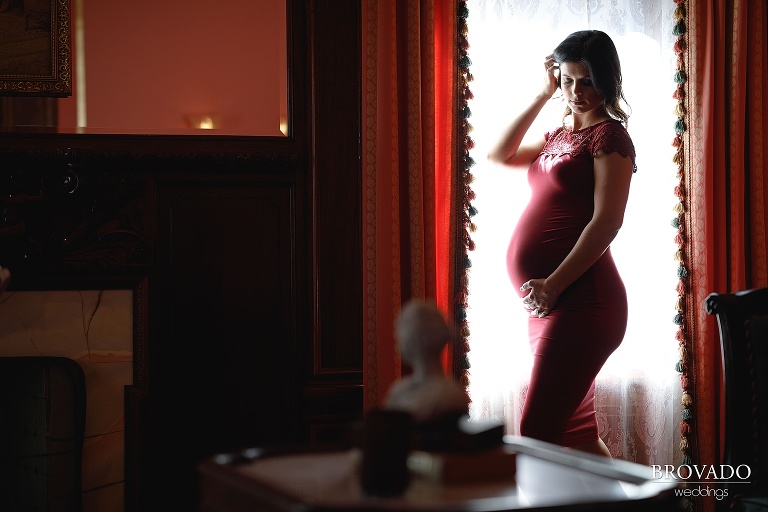 Maternity silhouette in front of window