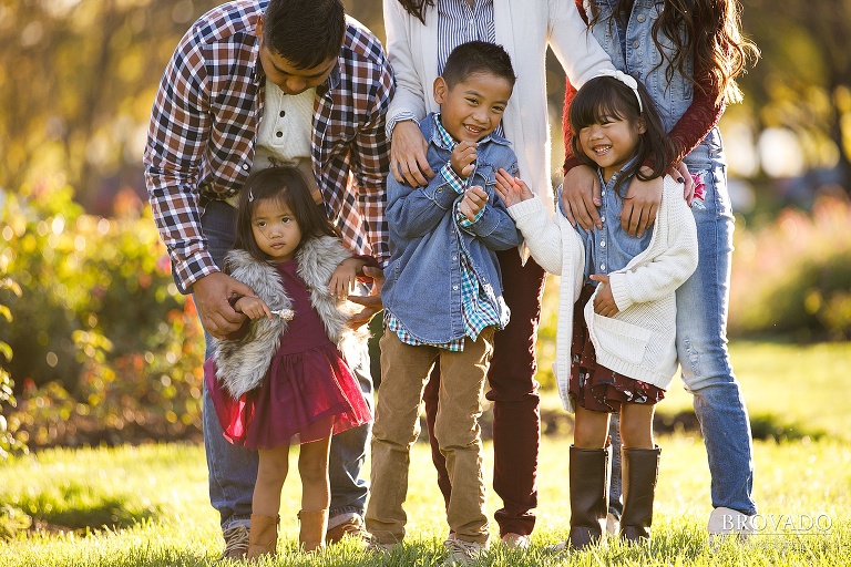 Parents Bonnie and Voone tickling their kids