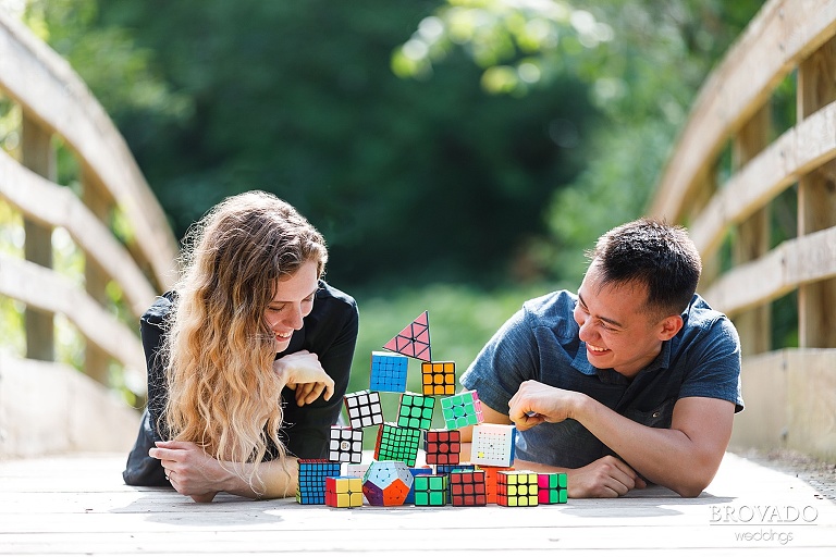 Sarah and Chris posing by rubik's cubes