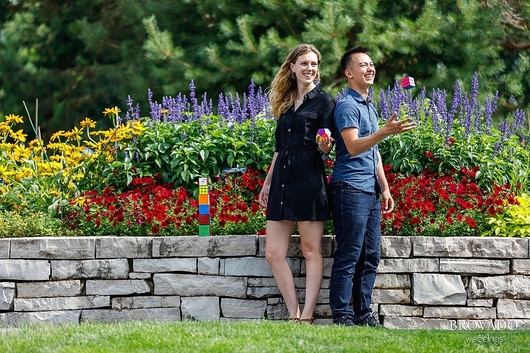 speedcubing couple tossing rubik's cubes in the air