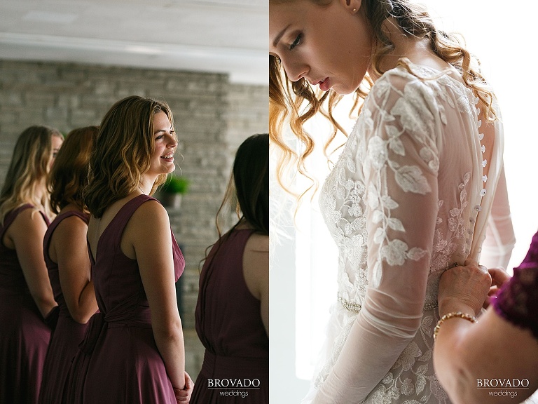 Mother of the bride helping to button up her dress