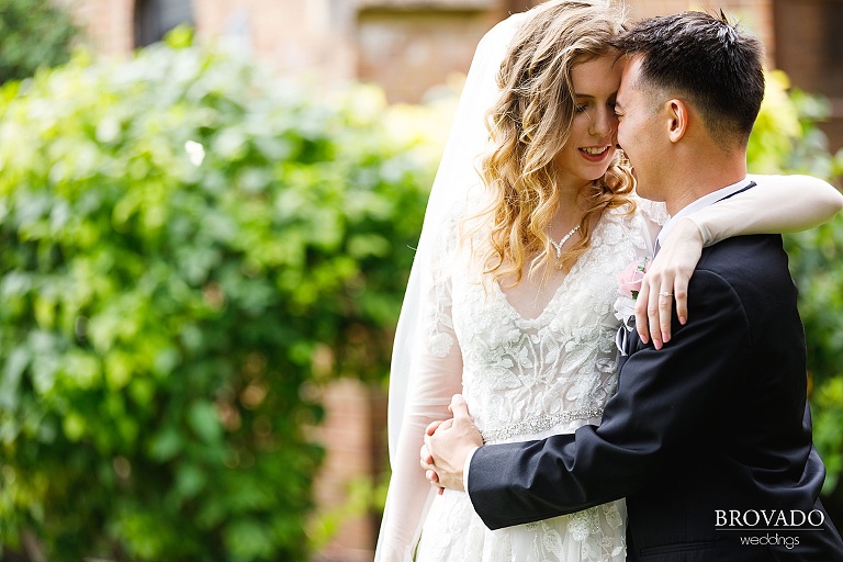 Bride and groom embracing