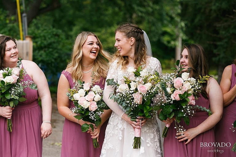 Sarah laughing with her bridesmaids