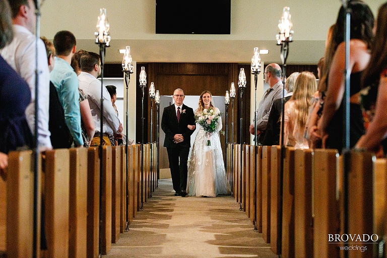 Sarah and her father walking down the aisle
