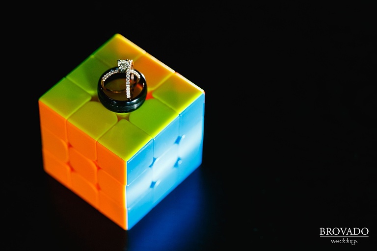 Wedding rings on top of a rubik's cube