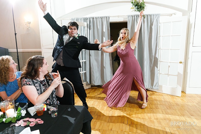 Maid of honor and best man dancing during grand entrance