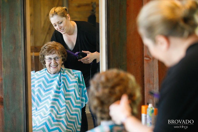 Grandmother of the bride getting her hair styled for wedding