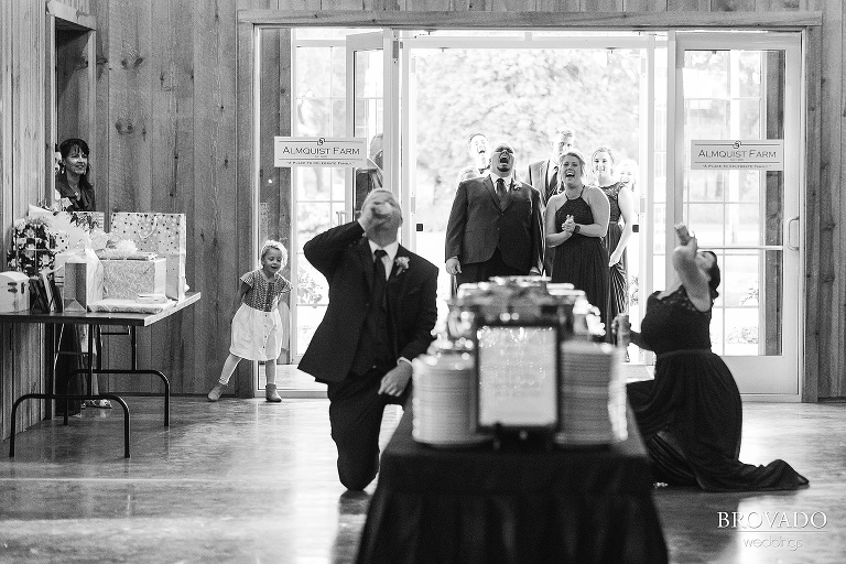 Wedding party chugging beers during grand entrance