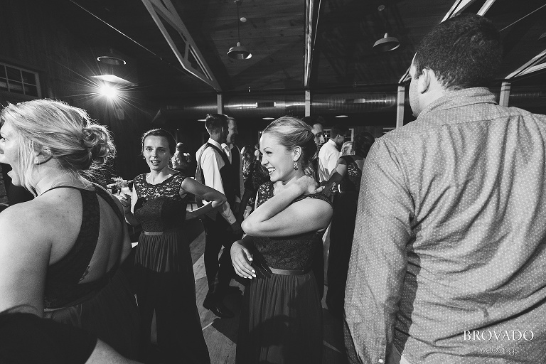 Bridesmaid smiling on the dance floor