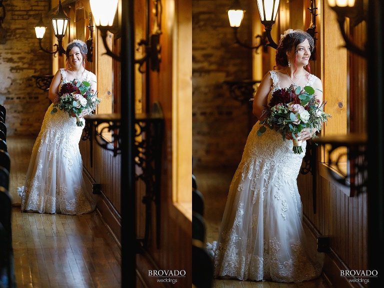 Bride posing by windowsill