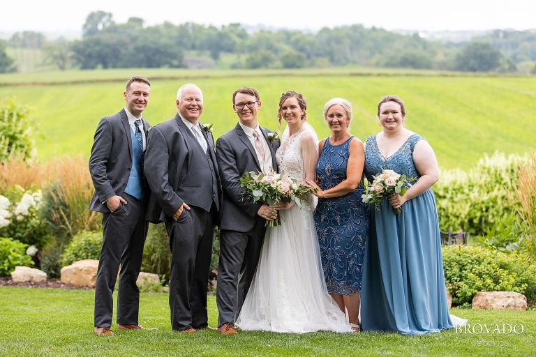 Heather and Daniel posing with Heather's family