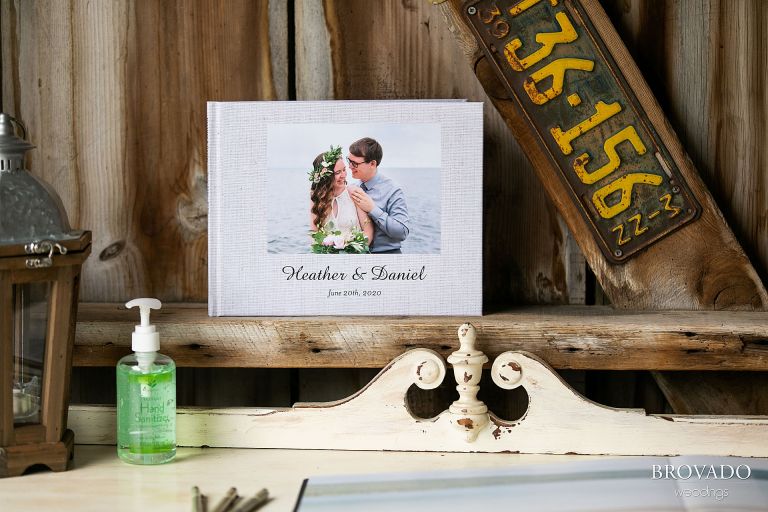 Heather and Daniel's guest book rests on a table