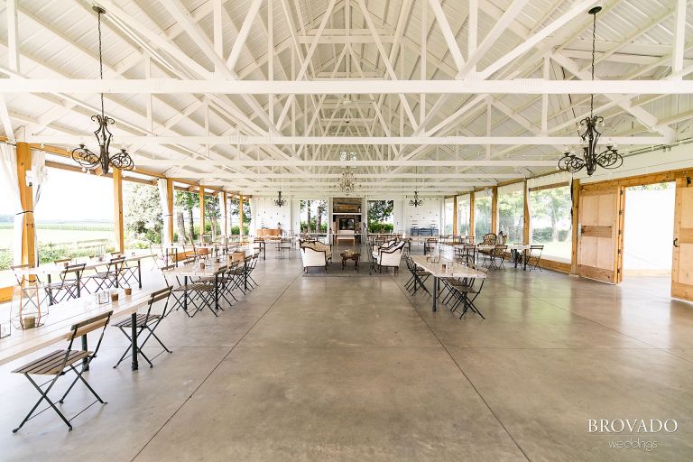 Wide angle of indoor reception space at Legacy Hill Farms