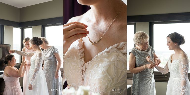 Bride putting on her wedding dress and snitch necklace