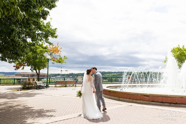 Newlyweds kissing in St. Paul park