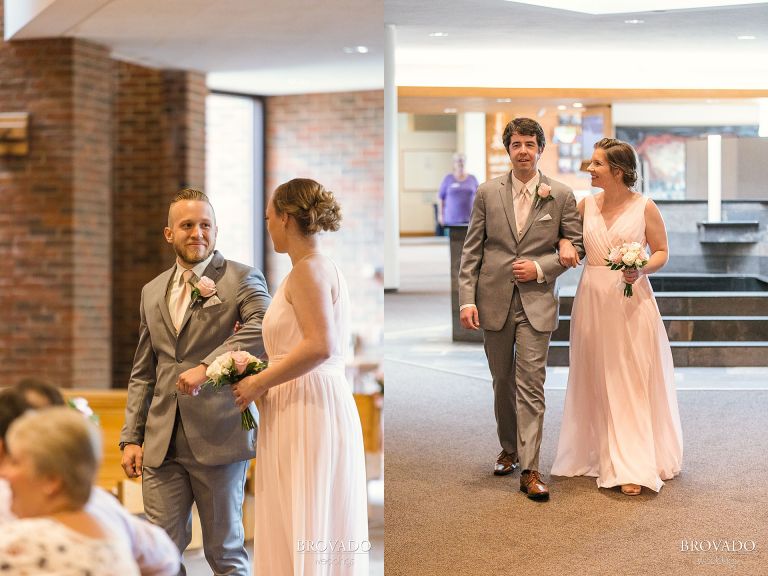 Wedding party walking down the aisle of guardian angels church