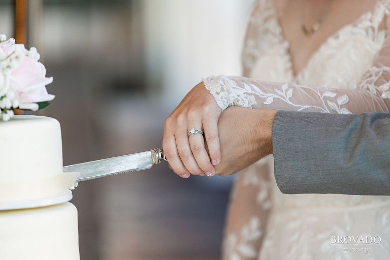 Bride and groom cutting their cake