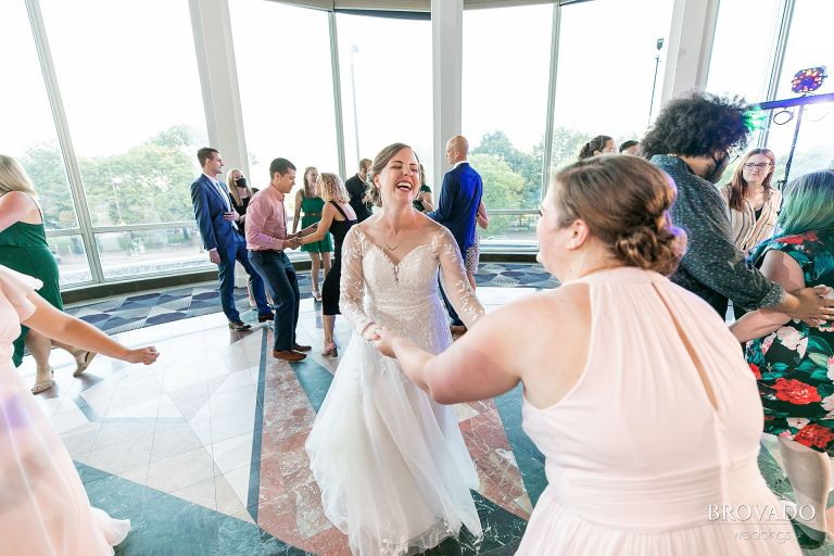 Bride dancing with a bridesmaid