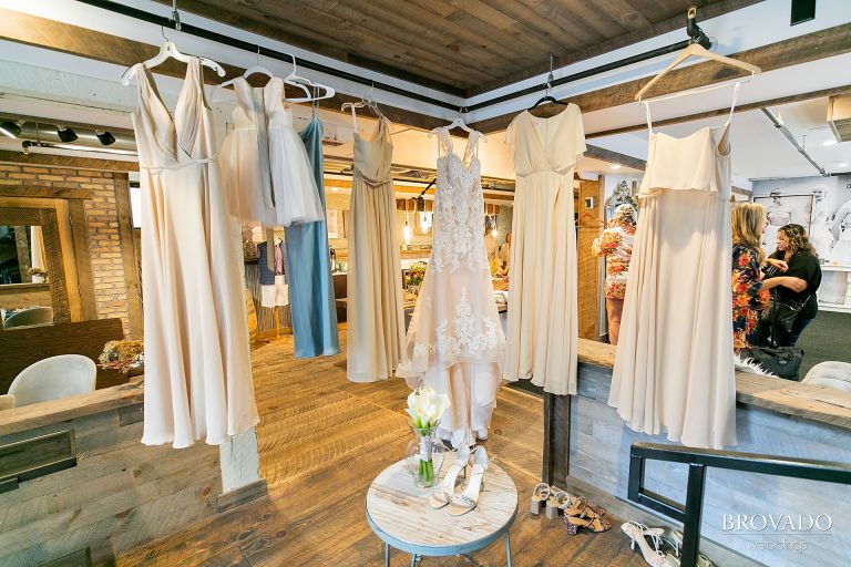 Bridal and bridesmaid dresses hanging up in hotel