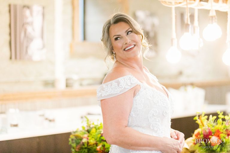 Stunning bride smiling over her shoulder