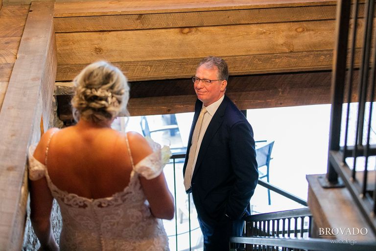 Groom smiling during first look