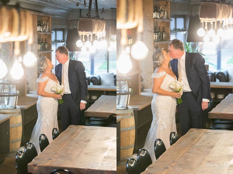 Bride and groom kissing at Stillwater hotel